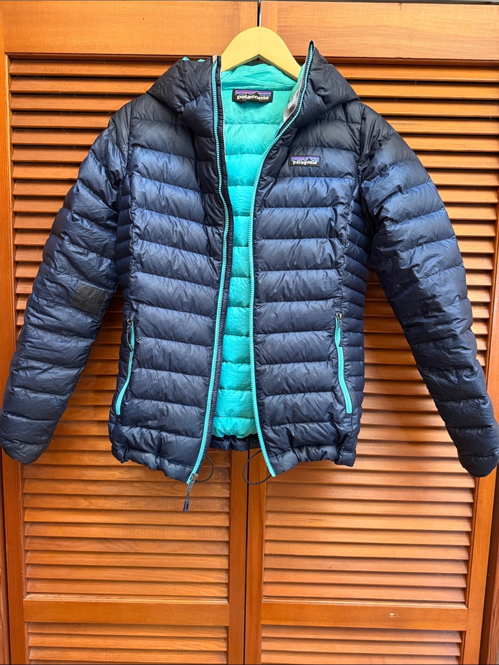 Patagonia Women's Navy Puffer Jacket with Teal Interior, Hood - Small
